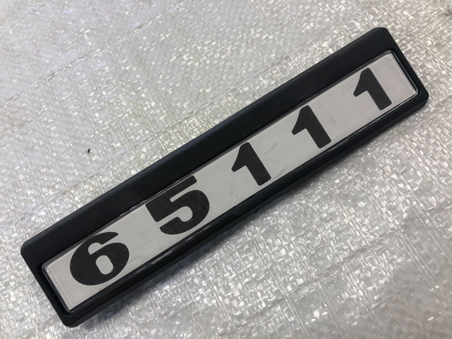 Табличка кабіни 65111 старого зразка (чорно-білі) для КамАЗ 65111-8202074